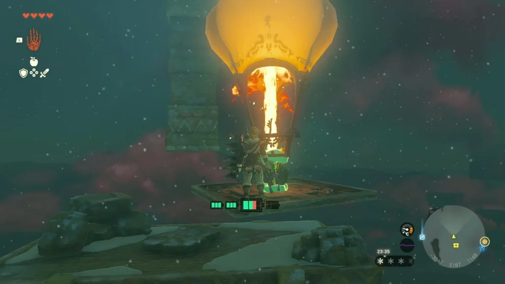 Flaming balloon lift rising beside the islands in the storm Flaming balloon lift rising beside the islands in the storm