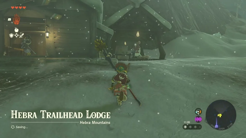 Hebra Trailhead Lodge in the snow, marked by a bonfire Hebra Trailhead Lodge in the snow, marked by a bonfire