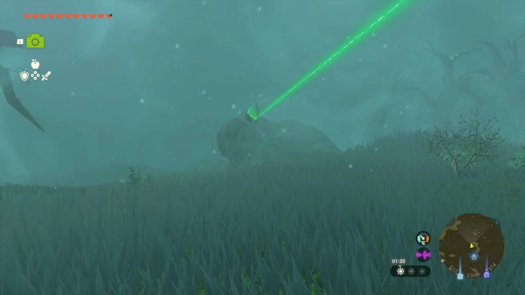 Green beam of light rising from the fog toward the crystal Green beam of light rising from the fog toward the crystal
