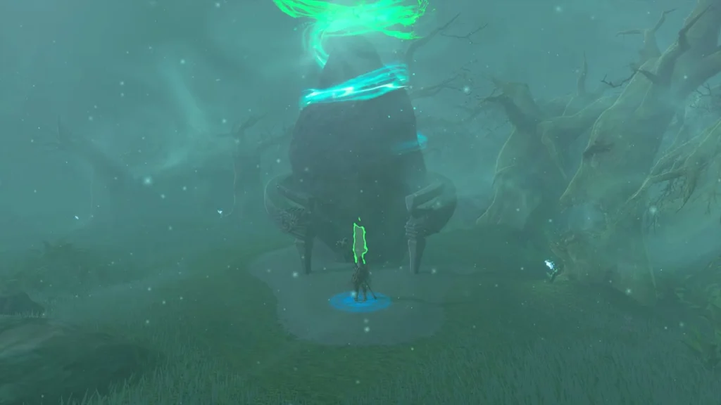 Shrine of Light rising from the fog with a green beam above it Shrine of Light rising from the fog with a green beam above it