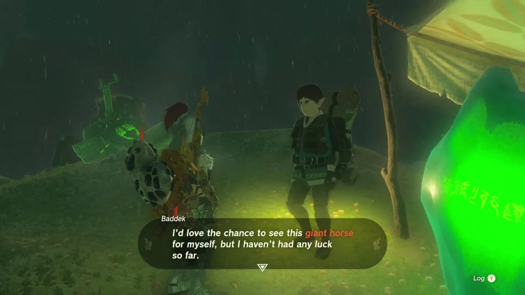 Baddek standing under his tent next to the large green crystal Baddek standing under his tent next to the large green crystal