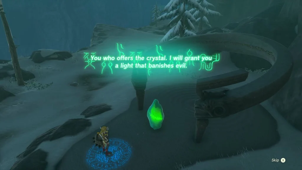 Green crystal floating near the blue shrine pad in the snow Green crystal floating near the blue shrine pad in the snow