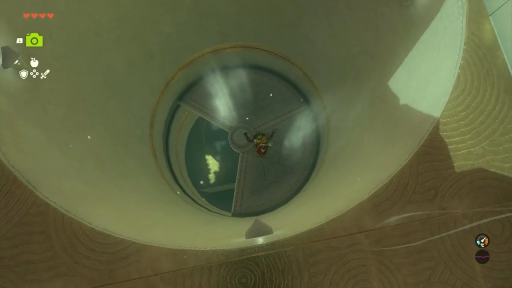 Round shaft with a spinning fan seen from above Round shaft with a spinning fan seen from above