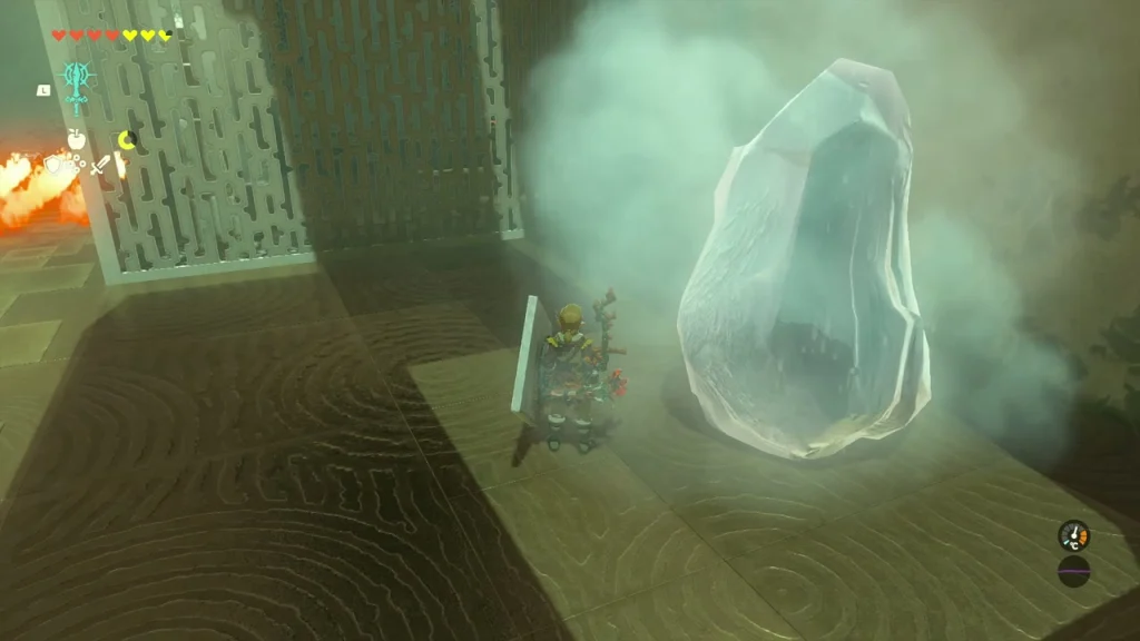 Large ice block melting with steam beside the barred wall Large ice block melting with steam beside the barred wall