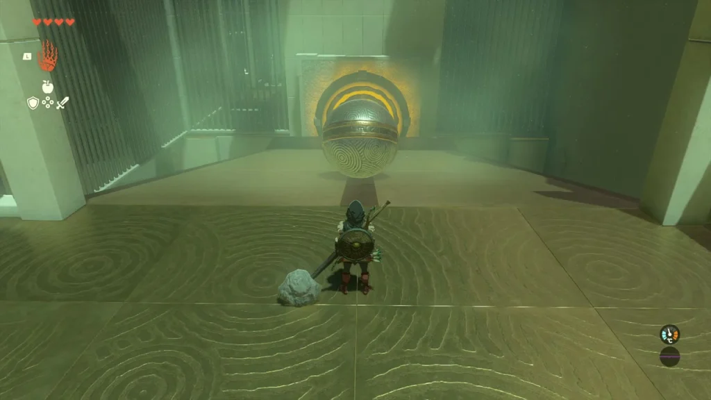 Metal ball set in front of the orange ring target on the far wall Metal ball set in front of the orange ring target on the far wall