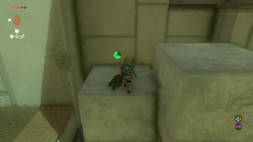 Two stone cubes at different heights forming steps toward the high wall ledge