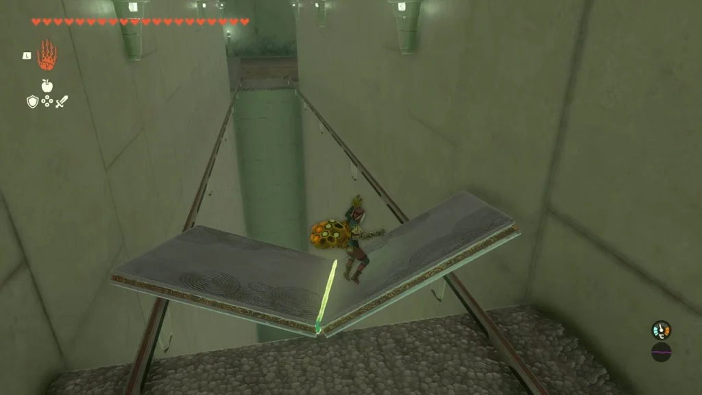 V-shaped cart of two grey slabs set across two rails V-shaped cart of two grey slabs set across two rails
