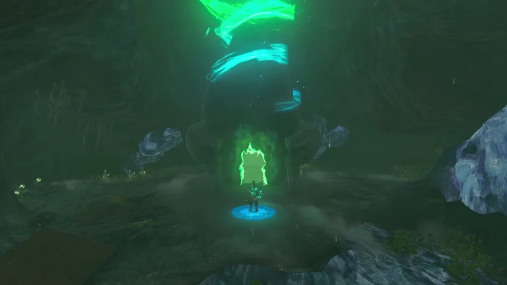 Glowing green shrine door in a dark cave on a blue pad Glowing green shrine door in a dark cave on a blue pad
