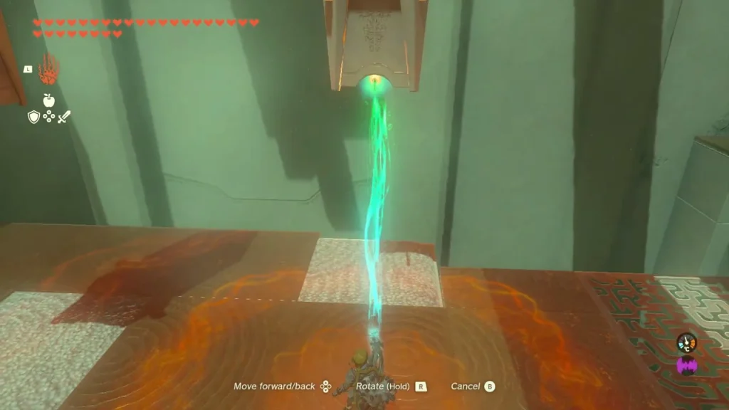 Candle raised on an Ultrahand beam above a white pad