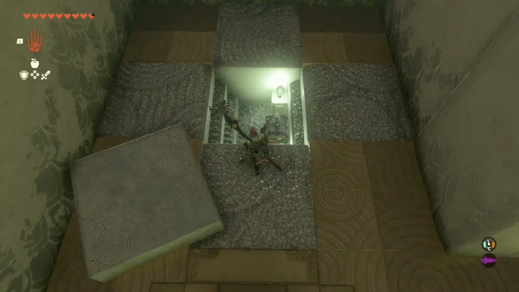 Floor tile slid aside revealing a lit pit below Floor tile slid aside revealing a lit pit below