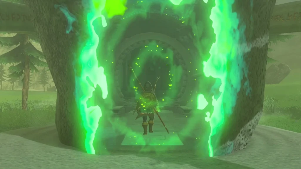 Glowing green arched doorway cut into the front of the boulder