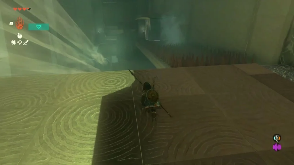 Corridor with air jets blowing in from the wall toward a spike pit