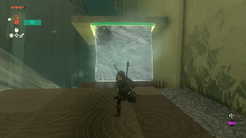 Ice block sitting in the ceiling chute above the flame room floor