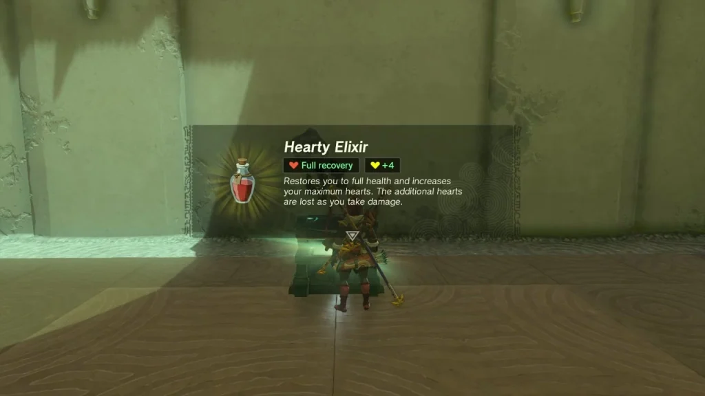 Item box reading Hearty Elixir in front of the side-room chest