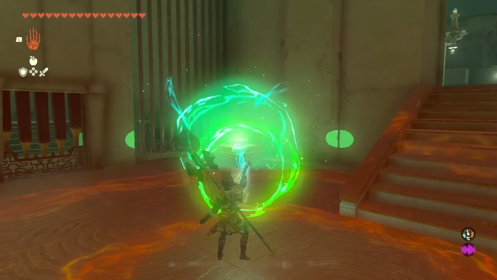 Orb returning along its path in a green swirl beside the barred side gate