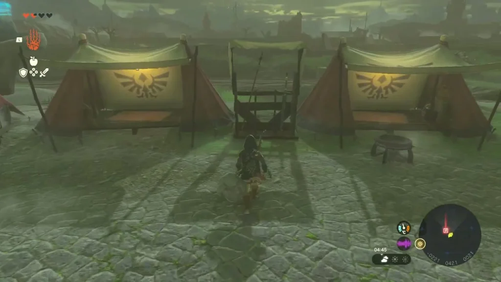 Red search party tents with the Hylian crest on the cobbled road through Hyrule Castle Town Ruins Red search party tents with the Hylian crest on the cobbled road through Hyrule Castle Town Ruins