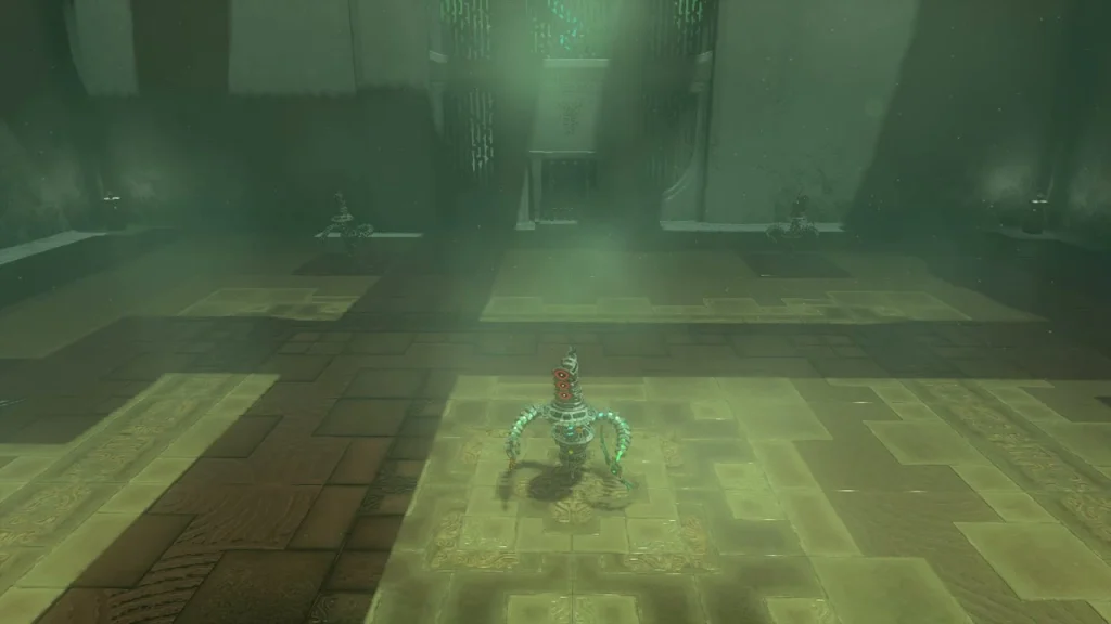 Small Construct with a red-lit head standing on a floor pad at the far end of the arena Small Construct with a red-lit head standing on a floor pad at the far end of the arena