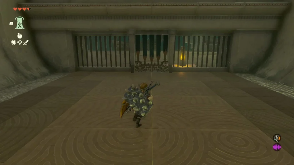 Barred stone gate at the end of the entrance hall with a crystal switch behind the bars Barred stone gate at the end of the entrance hall with a crystal switch behind the bars