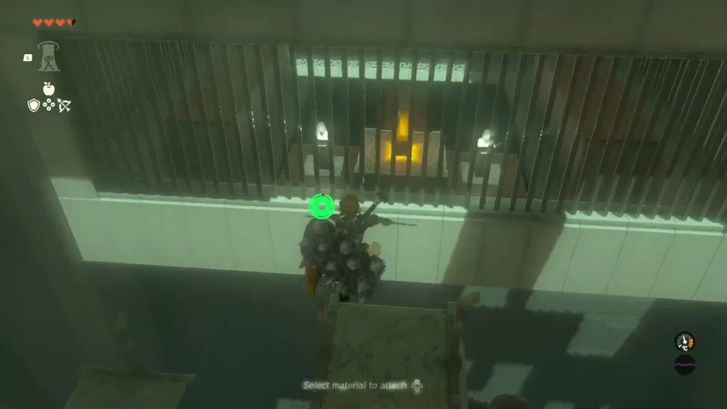 Large barred cell high in the shaft with a lit switch visible through its window Large barred cell high in the shaft with a lit switch visible through its window
