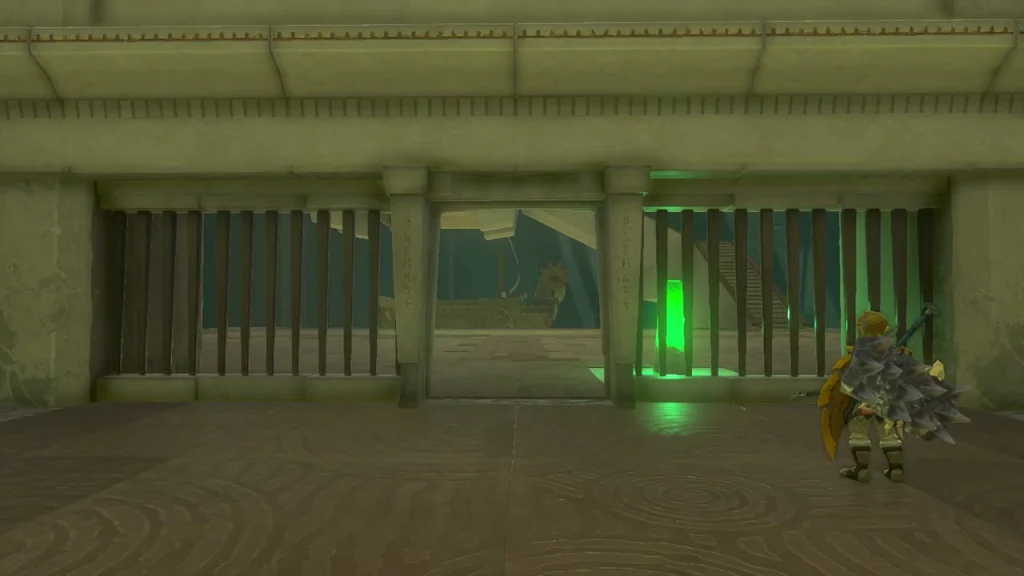 Green glow of the struck switch beside the raised gate bars Green glow of the struck switch beside the raised gate bars