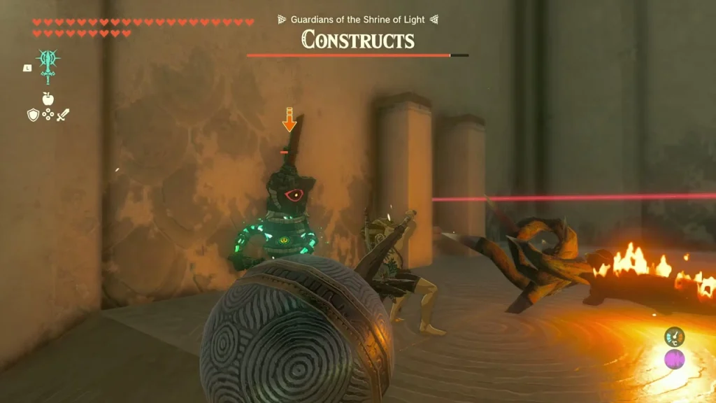 Soldier construct caught in flames next to an iron ball weapon Soldier construct caught in flames next to an iron ball weapon