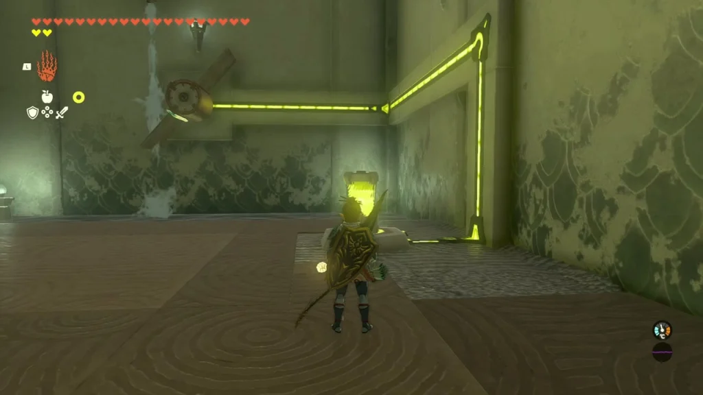 Charged battery lit yellow beside the wire line along the wall Charged battery lit yellow beside the wire line along the wall