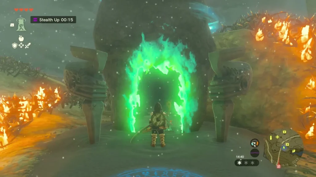 Glowing green shrine doorway between burnt thorns Glowing green shrine doorway between burnt thorns