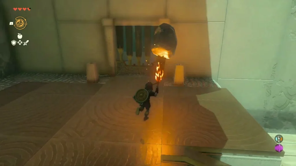 Burning weapon held to the barred wooden gate Burning weapon held to the barred wooden gate