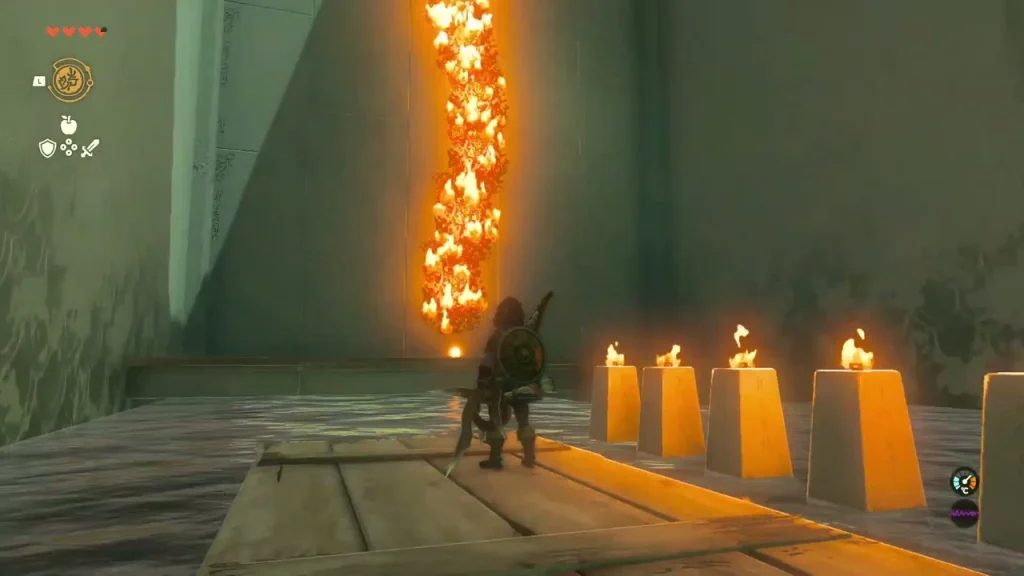 Column of flame as the hanging vines burn beside the row of candles Column of flame as the hanging vines burn beside the row of candles