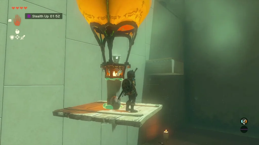 Board with an upright candle and a balloon fixed above it, forming a hot-air lift Board with an upright candle and a balloon fixed above it, forming a hot-air lift