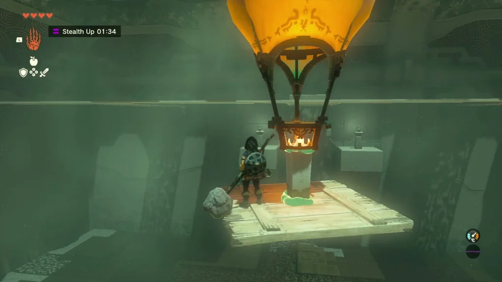 Candle-heated balloon platform rising beside the wall toward the upper ledge Candle-heated balloon platform rising beside the wall toward the upper ledge