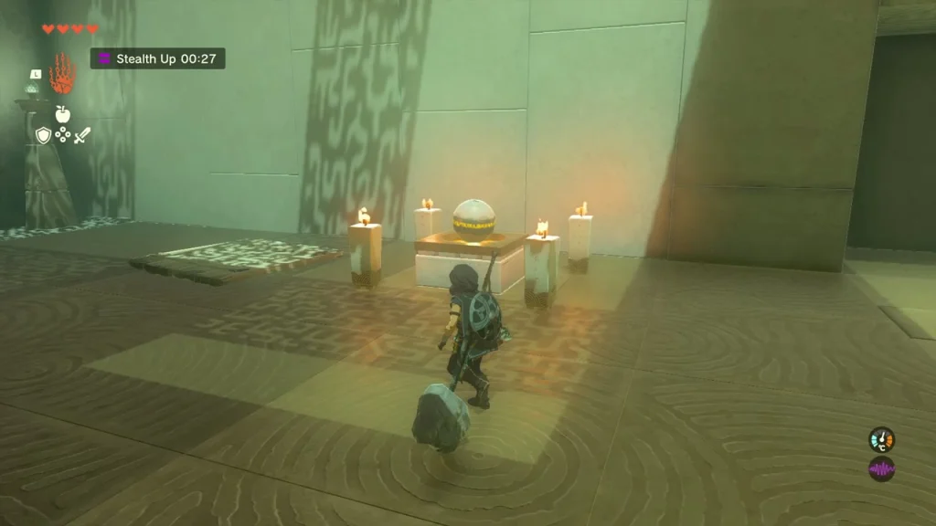 Small orb on a stone pedestal surrounded by four candles Small orb on a stone pedestal surrounded by four candles