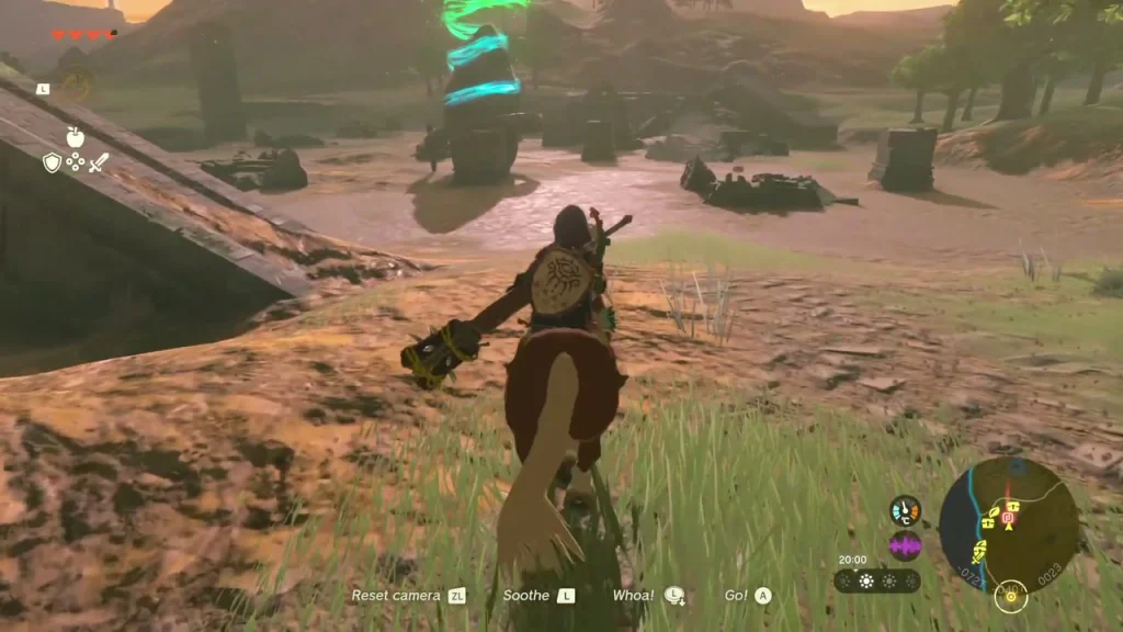 Broken walls and blocks of the Hyrule Garrison Ruins with the shrine's green light beam in the distance Broken walls and blocks of the Hyrule Garrison Ruins with the shrine's green light beam in the distance