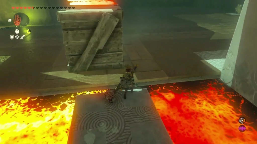 Stone block platform in the lava pit beside a wooden crate Stone block platform in the lava pit beside a wooden crate