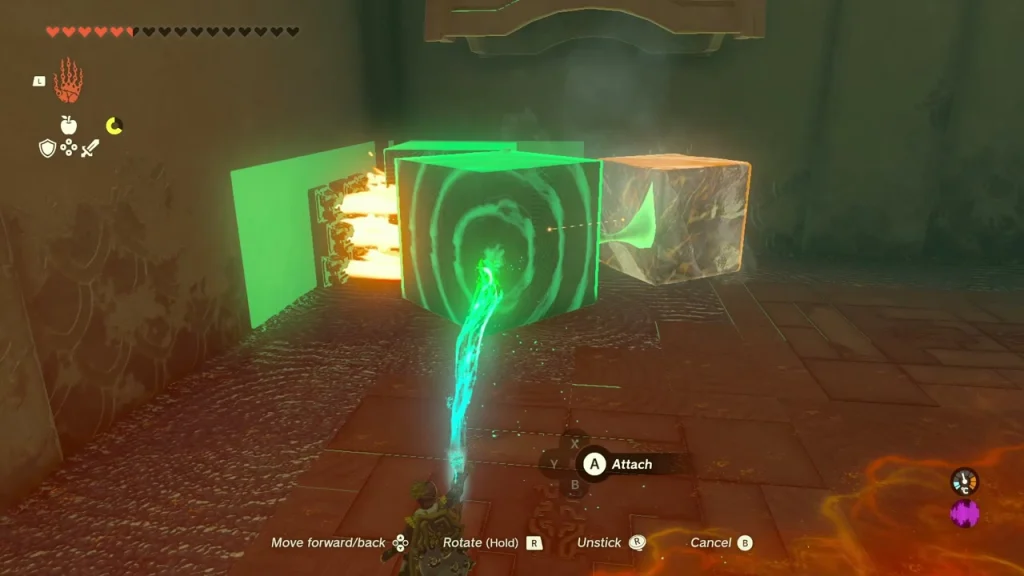 Metal block attached to an ice cube beside a flame jet Metal block attached to an ice cube beside a flame jet
