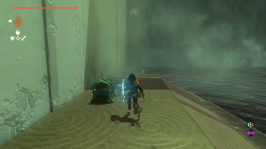 Chest on the stone platform at the end of the pool