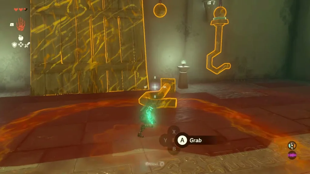 Wooden board by the wall with a metal hook on the floor and a second hook hanging from a chain ring Wooden board by the wall with a metal hook on the floor and a second hook hanging from a chain ring