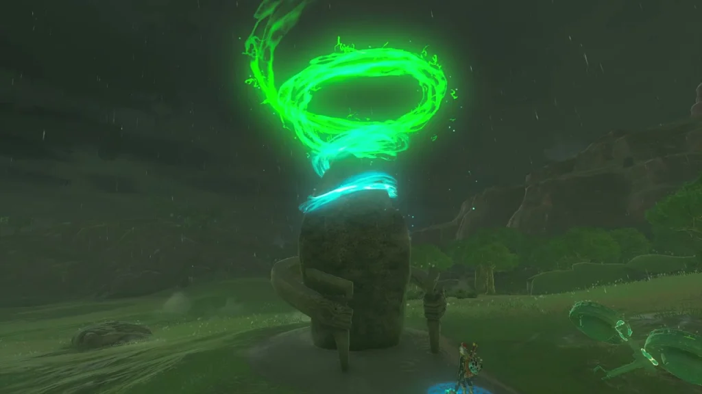 Green light spiralling above a rock where the crystal is set