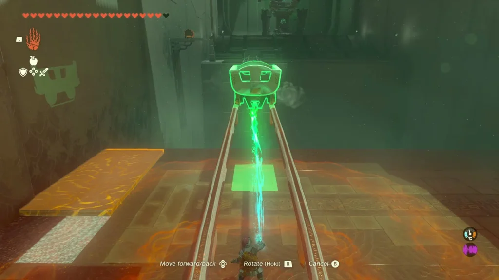 Mine cart on a track with an orange plank beside it