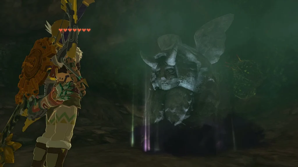 Horned Statue with the heart meter reduced after taking a Heart Container Horned Statue with the heart meter reduced after taking a Heart Container