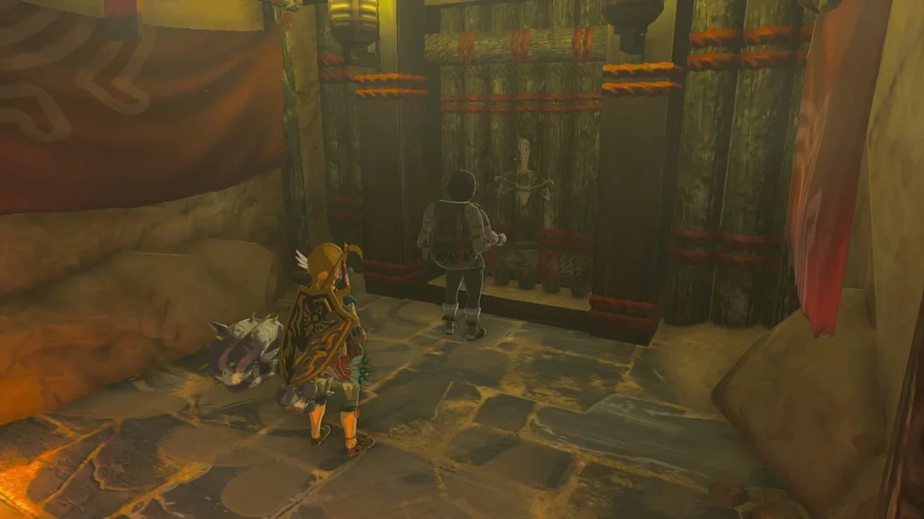 Barred wooden gate of the Yiga Clan Hideout with Mimos standing in front Barred wooden gate of the Yiga Clan Hideout with Mimos standing in front