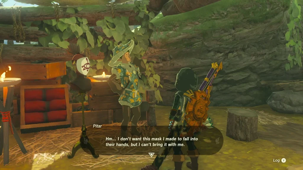 Pitar beside a Yiga mask on display in a wooded hideout hut Pitar beside a Yiga mask on display in a wooded hideout hut