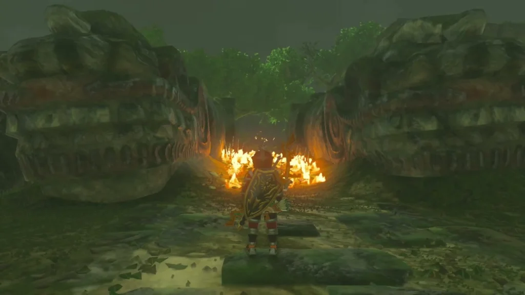 Flames burning between two carved dragon statues in the ruins Flames burning between two carved dragon statues in the ruins