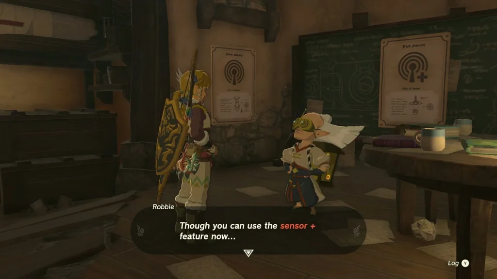 Robbie in the Hateno Ancient Tech Lab with the Sensor+ poster behind him