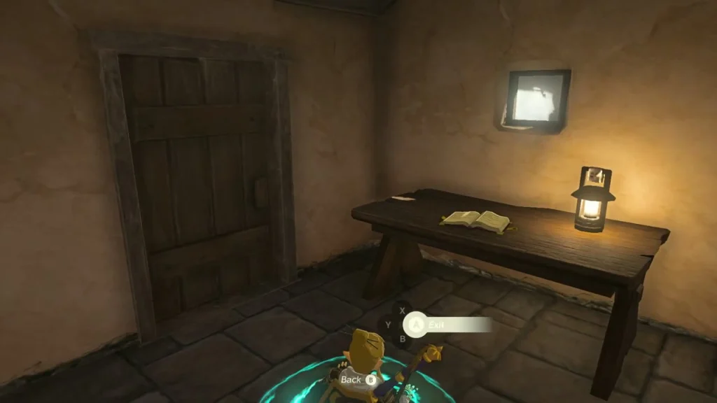 Small wooden desk with an open diary and lantern inside Reede's shed