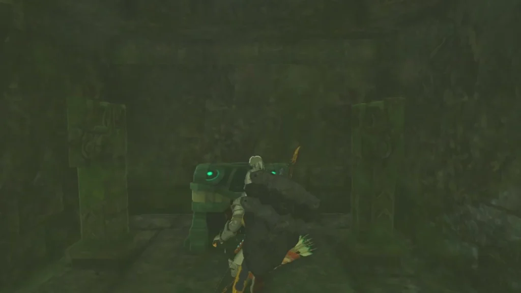 Hidden chest glowing between two stone pillars inside the chamber Hidden chest glowing between two stone pillars inside the chamber