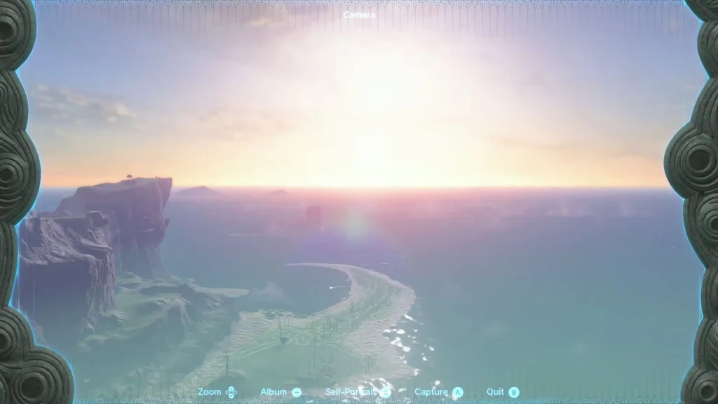 Camera view of the sun rising over the sea with a headland on the left Camera view of the sun rising over the sea with a headland on the left