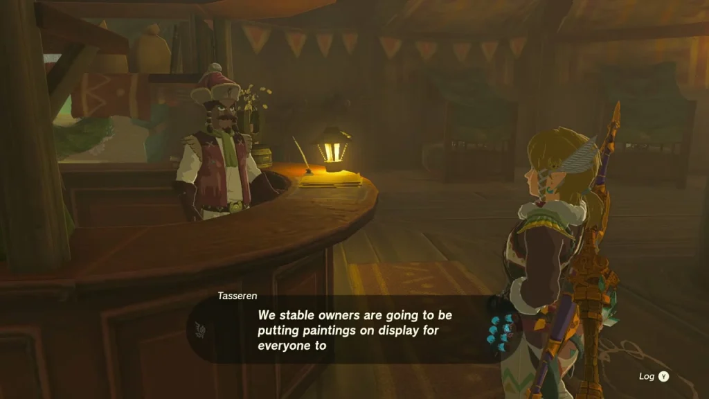 Tasseren behind the curved wooden counter of Dueling Peaks Stable Tasseren behind the curved wooden counter of Dueling Peaks Stable
