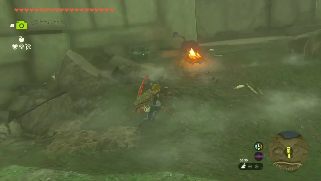 Campfire burning among rubble inside the Ring Ruin Campfire burning among rubble inside the Ring Ruin