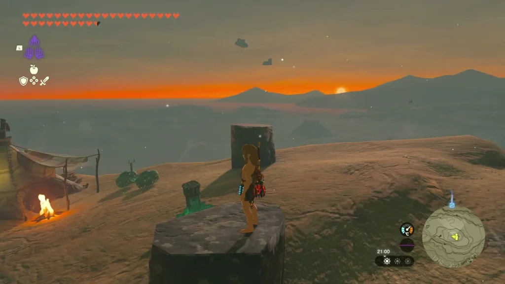 Standing on the stone pillar beside Rahdo's tent